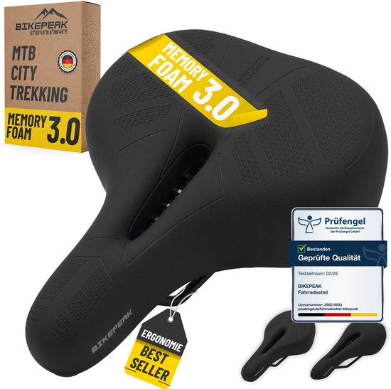 Zwart memory foam fietszadel 'Ergonomie Best Seller' met 'MEMORY FOAM 3.0' op een gele band, naast een doos.