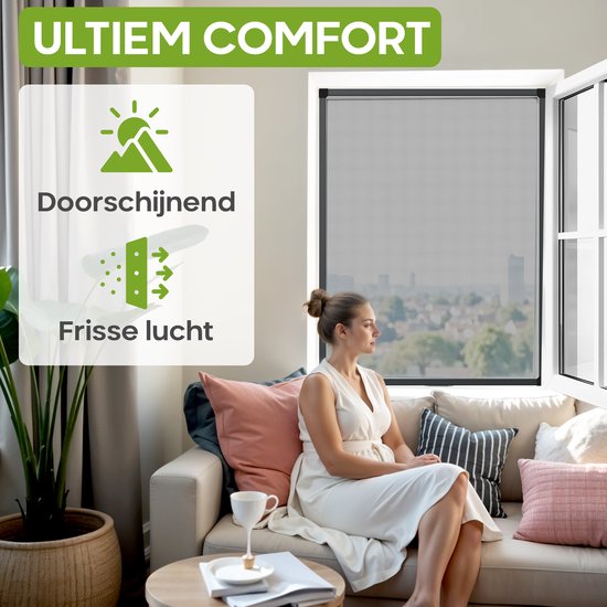 Vrouw kijkt uit het raam met hor, genietend van frisse lucht en zon.