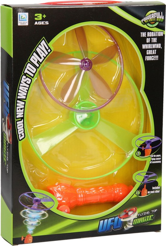 Doos met oranje vliegende top speelgoed met paarse en groene propellers en vliegende schijf.