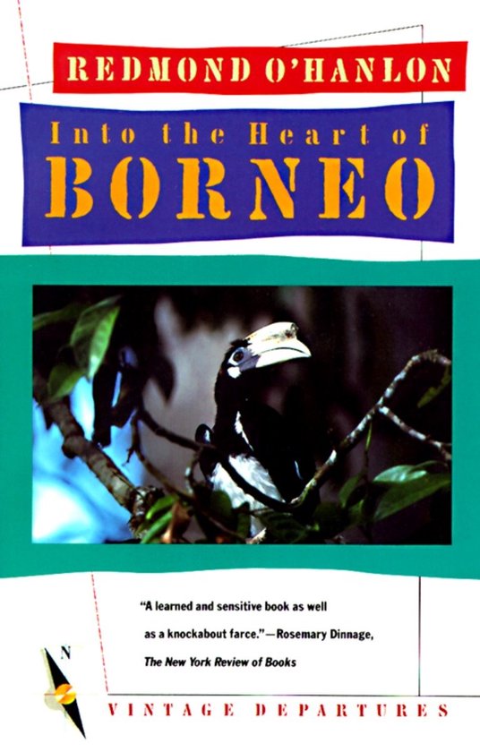 Boek 'Into the Heart of Borneo' door Redmond O'Hanlon, met een gehornde neushoornvogel op een tak.