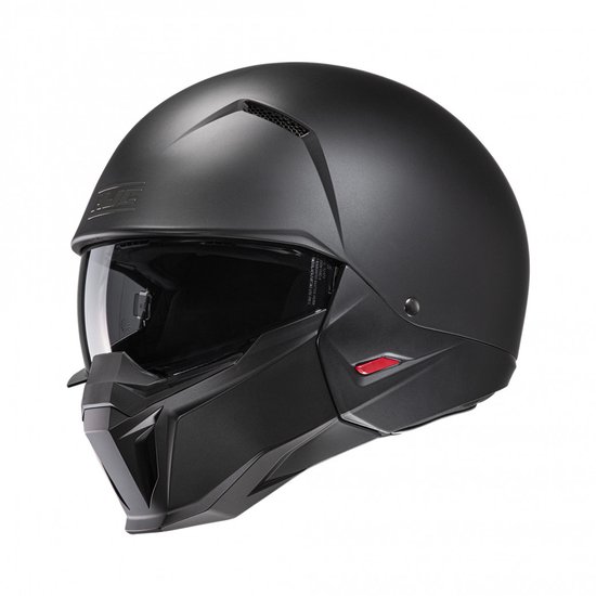 Matzwarte HJC motorhelm met vizier en matgrijs kin-gedeelte.