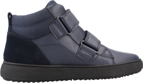 Vue détaillée de la sneaker Geox bleu marine, avec fermetures velcro et talon en daim.