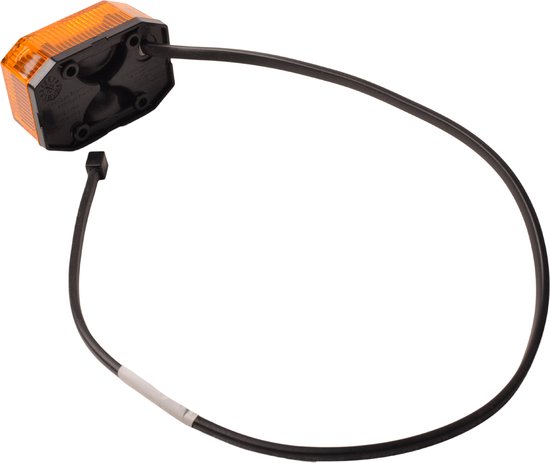Onderkant van octogonale oranje LED lamp met geribbeld oppervlak, zwarte behuizing en kabel.