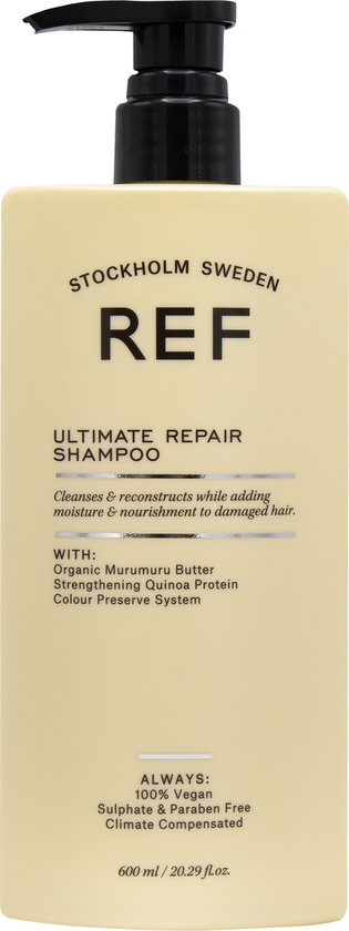 Beige fles met zwarte pompdispenser. Tekst: REF STOCKHOLM SWEDEN ULTIMATE REPAIR SHAMPOO, 600 ml / 20.29 fl.oz.