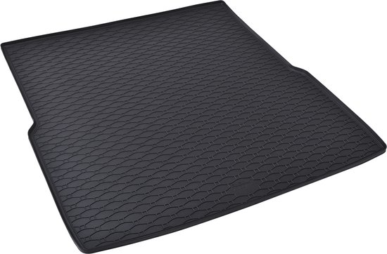 Tapis de coffre noir avec motif en nid d'abeille, posé sur fond blanc.