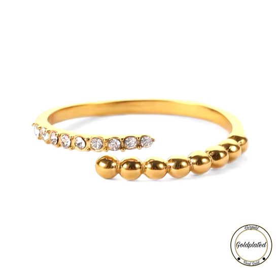 Gouden klemring met zirkonia en bubbels.