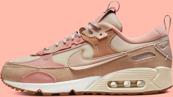 Bruine en roze Nike Air Max 90 sneaker met beige mesh en suède details. Zichtbare Air unit in de zool.