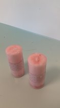 2 roze kaarsen