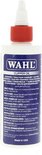 Wahl Clipper Oil flesje met rode dop en blauw label met meertalige instructies.