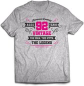 92 Jaar Legend - Feest kado T-Shirt Heren / Dames - Antraciet Grijs / Roze - Perfect Verjaardag Cadeau Shirt - grappige Spreuken, Zinnen en Teksten. Maat XXL
