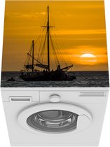 Wasmachine beschermer mat - Grote zeilboot vaart in de zee tijdens zonsondergang in Aruba - Breedte 60 cm x hoogte 60 cm
