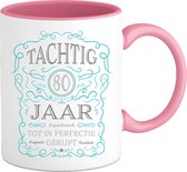 80 Jaar Legendarische Gebrouwen Mok met tekst | Blauw - Zilver | Grappig Verjaardag Beker Cadeau | Bedrukte Mokken | Roze | 330 ML