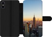Bookcase Geschikt voor iPhone XS Max telefoonhoesje - New York - Skyline - Zonsondergang - Met vakjes - Wallet case met magneetsluiting