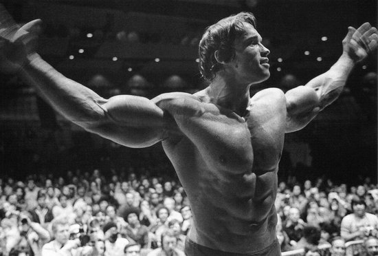 ? Arnold Schwarzenegger • Conquer Canvas 150x100 cm • Foto print op Canvas schilderij ( Wanddecoratie woonkamer / slaapkamer / keuken / kantoor / bar / restaurant ) / Bodybuilding Canvas Schilderijen / Poster