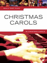 Boek 'Christmas Carols' met afbeelding van handen die pianospelen.