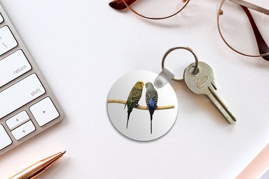 Porte-clés - Deux perruches de dos - Plastique - Rond