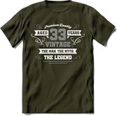 33 Jaar Legend T-Shirt | Zilver - Wit | Grappig Verjaardag en Feest Cadeau | Dames - Heren - Unisex | Kleding Kado | - Leger Groen - L
