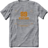 99 Jaar Legend T-Shirt | Goud - Zilver | Grappig Verjaardag Cadeau | Dames - Heren | - Donker Grijs - Gemaleerd - L