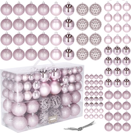 Doos met 100 roze kerstballen in verschillende afwerkingen: glanzend, mat, glitter en met reliëf. Ook losse ballen getoond.