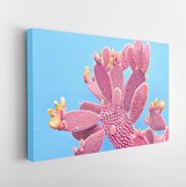 Canvas schilderij - Fashion Cactus Coral colored on pastel Blue background. Trendy tropical cacti plant close-up. Art Concept. Creative Style. Coral fashionable cactus Mood  -