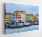 Canvas schilderij - Colored facades of Nyhavn in Copenhagen in Denmark in winter  -    1186214725 - 80*60 Horizontal