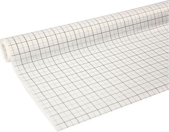 Uitgerold wit patroonpapier met een zwart raster, de rol is zichtbaar aan het einde.