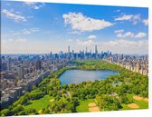 Groene strook van Central Park en de skyline van New York - Foto op Canvas - 150 x 100 cm