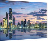 Uitzicht op de skyline van Abu Dhabi bij zonsondergang - Foto op Plexiglas - 90 x 60 cm