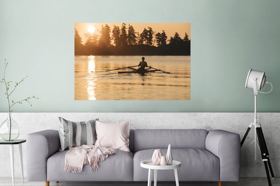 Un homme rame à un coucher de soleil Poster 120x80 cm - Tirage photo sur Poster (décoration murale salon / chambre) / Affiche de Sport