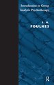Boek "Introduction to Group Analytic Psychotherapy" door S. H. Foulkes, met een blauwe marmeren achtergrond.