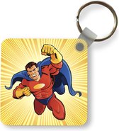 Illustration de porte-clés Superman - Une illustration d'un porte-clés super-héros en plastique - porte-clés carré avec photo