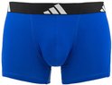 Koningsblauwe boxer met zwarte band met witte Adidas logo's.