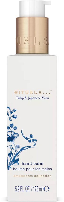 Rituals hand balm, Amsterdam Collection, met witte pompflacon en blauwe bloemendecoratie.