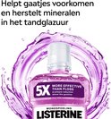 Listerine Total Care mondspoeling in paarse splash. Helpt gaatjes voorkomen en herstelt mineralen in glazuur.