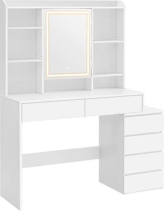 Coiffeuse blanche avec tiroirs, étagères ouvertes et miroir avec éclairage LED réglable. La coiffeuse est vide.