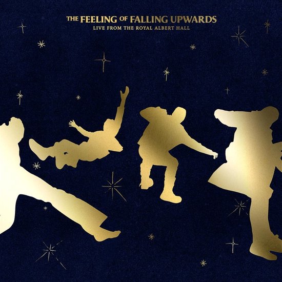 Gouden silhouetten van vier mensen die omhoog vallen tegen een donkerblauwe achtergrond met sterren. Tekst: THE FEELING OF FALLING UPWARDS, LIVE FROM THE ROYAL ALBERT HALL.