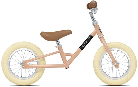 Roze loopfiets met lichtgele banden, bruin zadel en handvatten. Merknaam 'VELORETTI' op het frame.