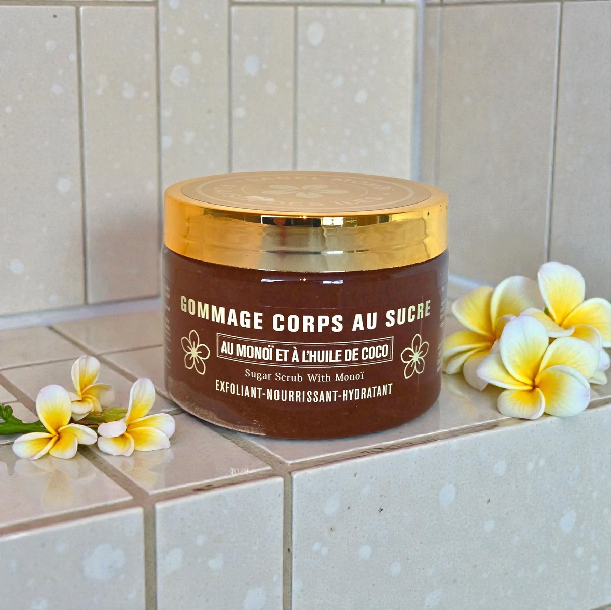 Lichaam suiker scrub met Monoï geur