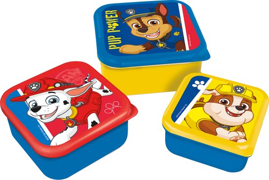 Trois boîtes à goûter Pat' Patrouille disposées en angle. Boîtes jaunes avec couvercles bleus représentant Chase, Marshall et Rubble.