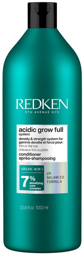Grande bouteille bleu sarcelle de Redken avec le texte "acidic grow full system conditioner".