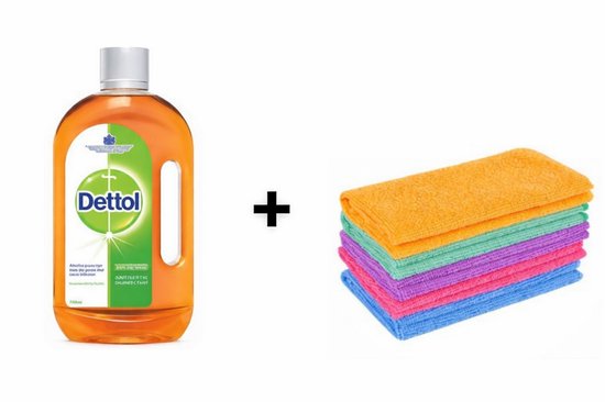 Oranje Dettol fles naast een stapel gekleurde microvezeldoeken: oranje, groen, paars, blauw.