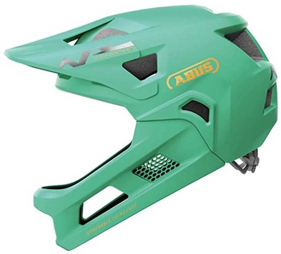 Zijaanzicht van een sage green fietshelm met klep, 'ABUS' logo en verstelband.