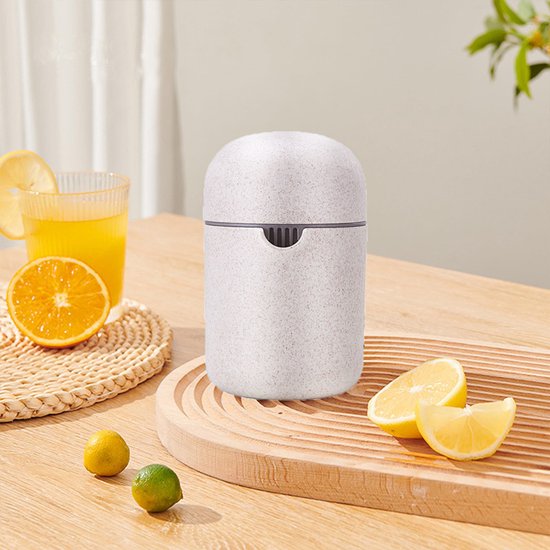 Handmatige Citruspers - 2-in-1 handmatige sapcentrifuge - Handmatige citruspers - Limoenpers met Bakje - Beige - Inclusief zeef - Kan citroenen, limoenen, druiven, sinaasappels, watermeloenen en ander fruit persen — afbeelding 4