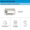HP Envy Inspire 7220e printer en inhoud van de doos: inkt, installatieflyer en netsnoer.
