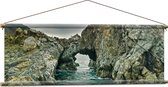 WallClassics - Textielposter - Bergen met Tunnel in de Zee - 120x40 cm Foto op Textiel
