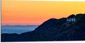 WallClassics - Dibond - Hollywood Sign met Zonsondergang - 100x50 cm Foto op Aluminium (Met Ophangsysteem)