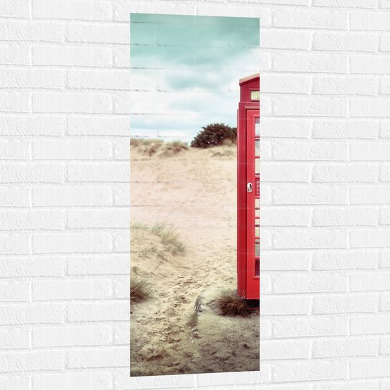 WallClassics - Muursticker - Rode Telefooncel in Duinen - 40x120 cm Foto op Muursticker
