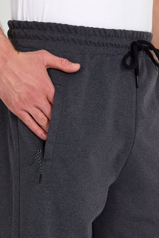 Dunne rekbare joggingbroek voor heren, met ritszakken, lichte Dunne rekbare joggingbroek voor heren, met ritszakken, lichte