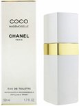 Witte parfumfles met gouden band naast COCO MADEMOISELLE CHANEL PARIS EAU DE TOILETTE 50 ml doosje.
