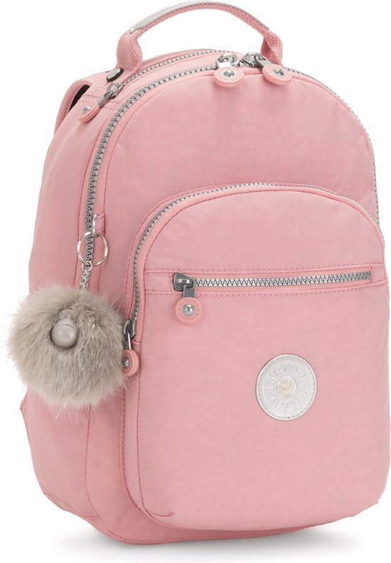 Sac à dos Kipling rose avec une poche zippée et un pompon en peluche.